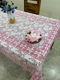 Pink and white patterned tablecloth 