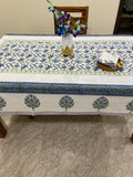 Decorative tablecloth with blue and white floral patterns