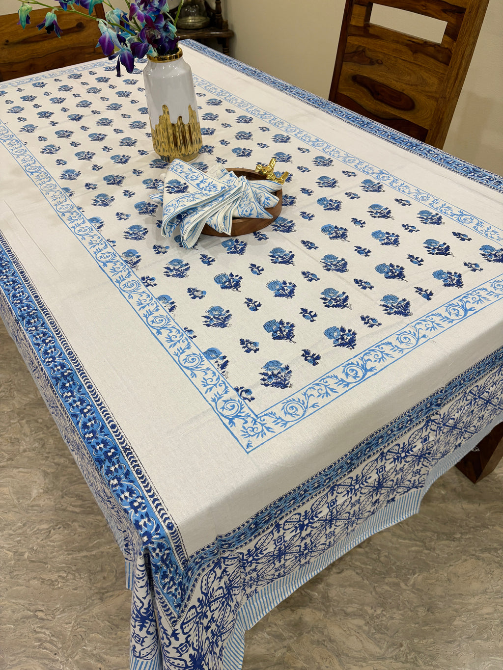 White fabric with blue floral patterns 